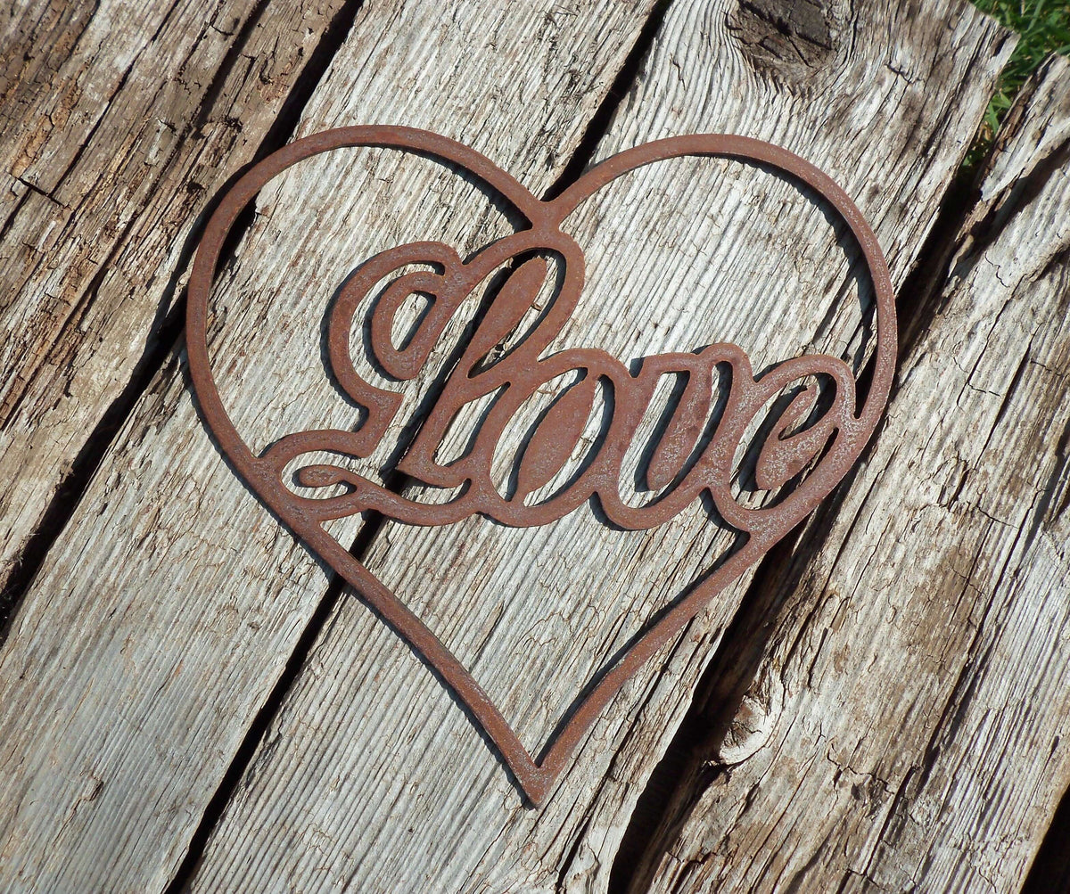 Rustic Steel Hearts Garden Gift Set - decorative heart-shaped metal art with 'Love' lettering on wooden background.