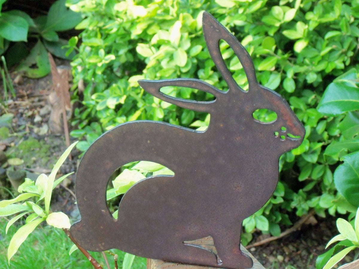 Rusted Steel RABBIT Garden Ornament showcasing unique rustic metal art with natural variations in patina.