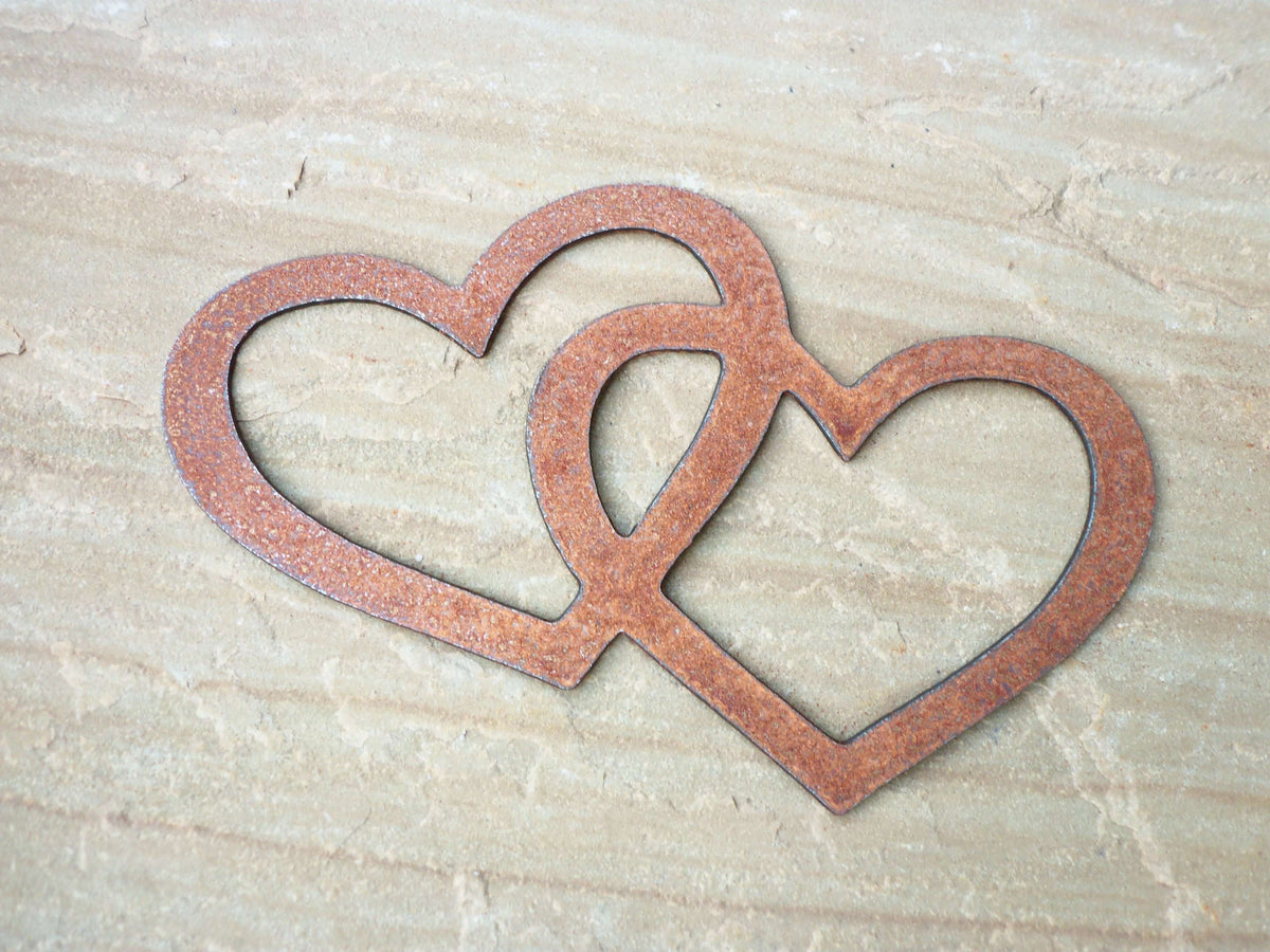 Rustic Steel Hearts Garden Gift Set - Two interlocking hearts made from rustic steel, ideal for garden decoration.