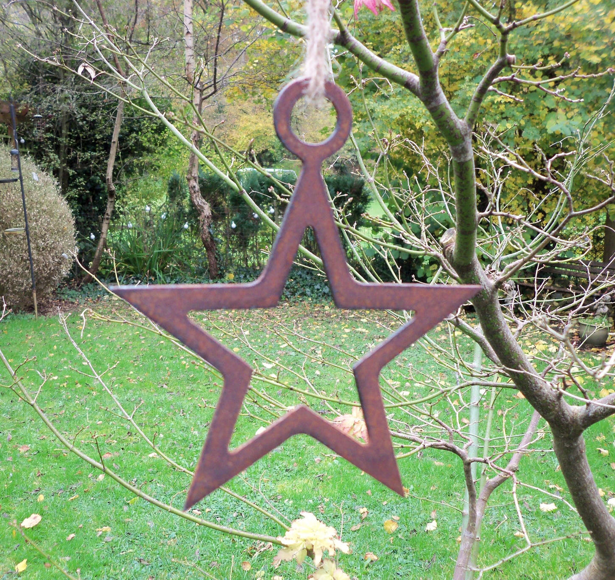 Rustic Steel Star Garden Gift Set - Rusty Metal hanging star garden ornament with string on a tree