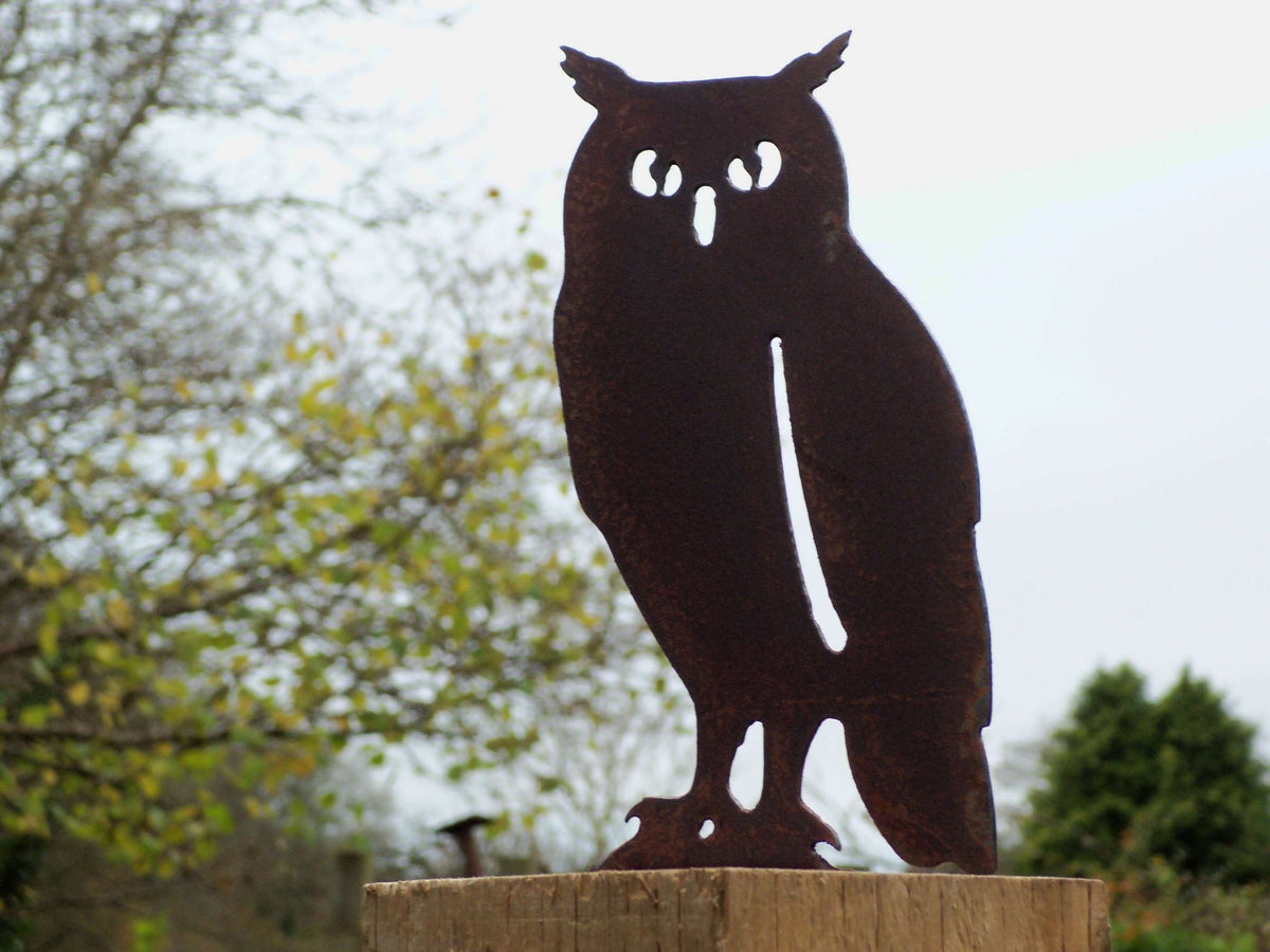 Rusted Steel OWL Garden Ornament perched on a fence post, showcasing rustic charm and unique patina finish.