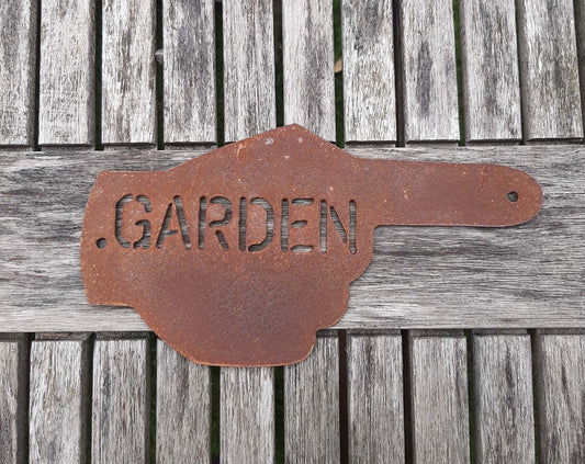 Rusty Metal Hand Pointer Arrow Garden Sign Ornament displayed on wood surface, featuring cut-out 'GARDEN' text.