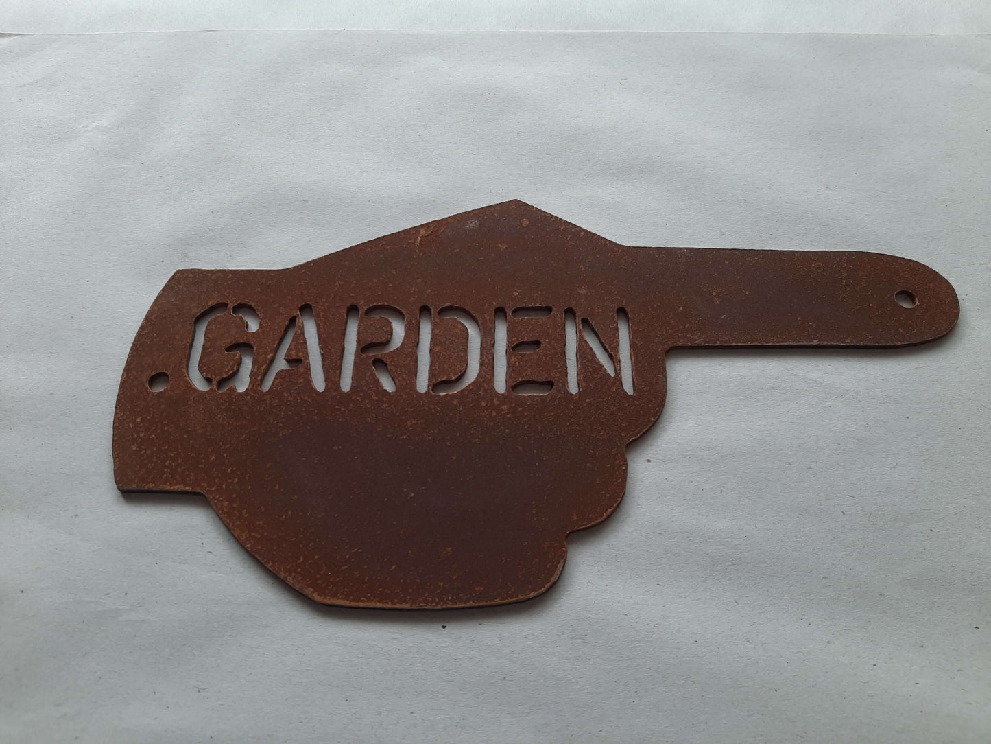 Rusty Metal Hand Pointer Arrow Garden Sign Ornament with 'GARDEN' text for rustic outdoor decor.