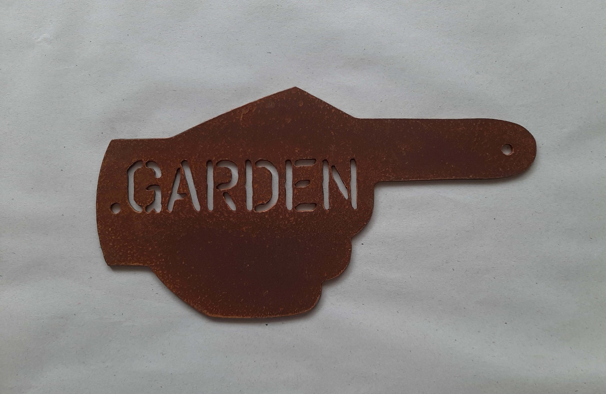 Rusty Metal Hand Pointer Arrow Garden Sign Ornament displaying the word 'GARDEN' in vintage style.