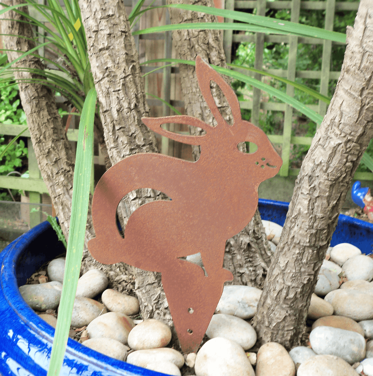 Rusted Steel RABBIT Garden Ornament in a flower pot, rustic metal animal decoration, unique design with a patina finish.